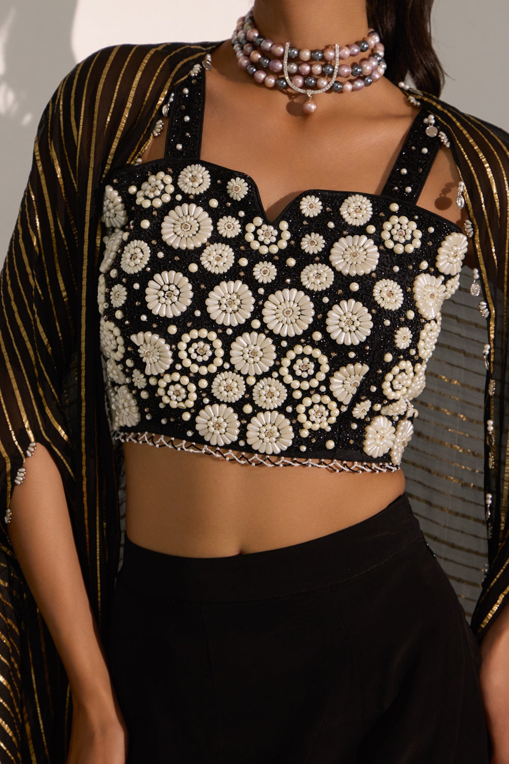Black Bustier With Side Slit Skirt & Cape Set.