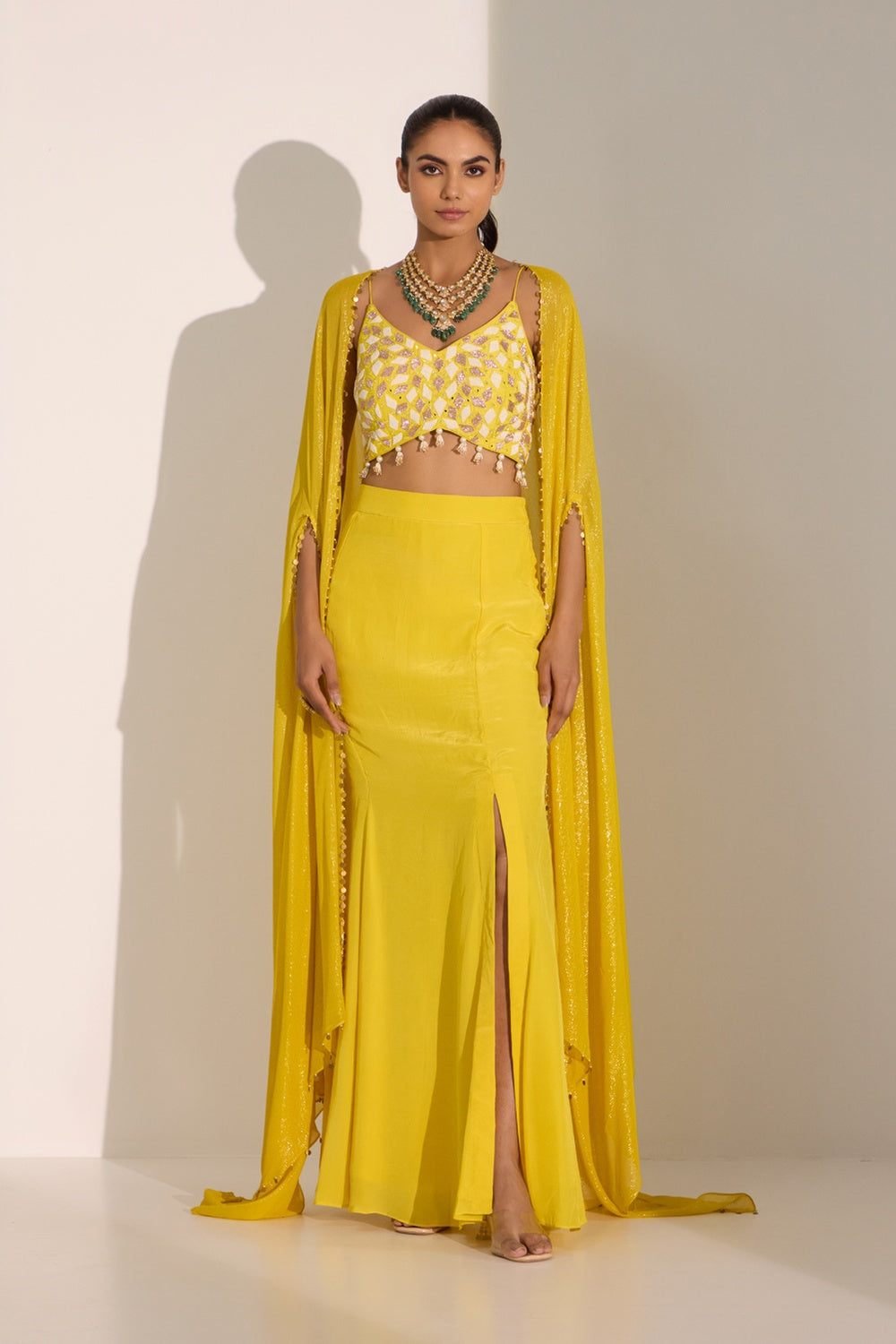 Yellow Bustier With Side Slit Skirt & Cape Set.