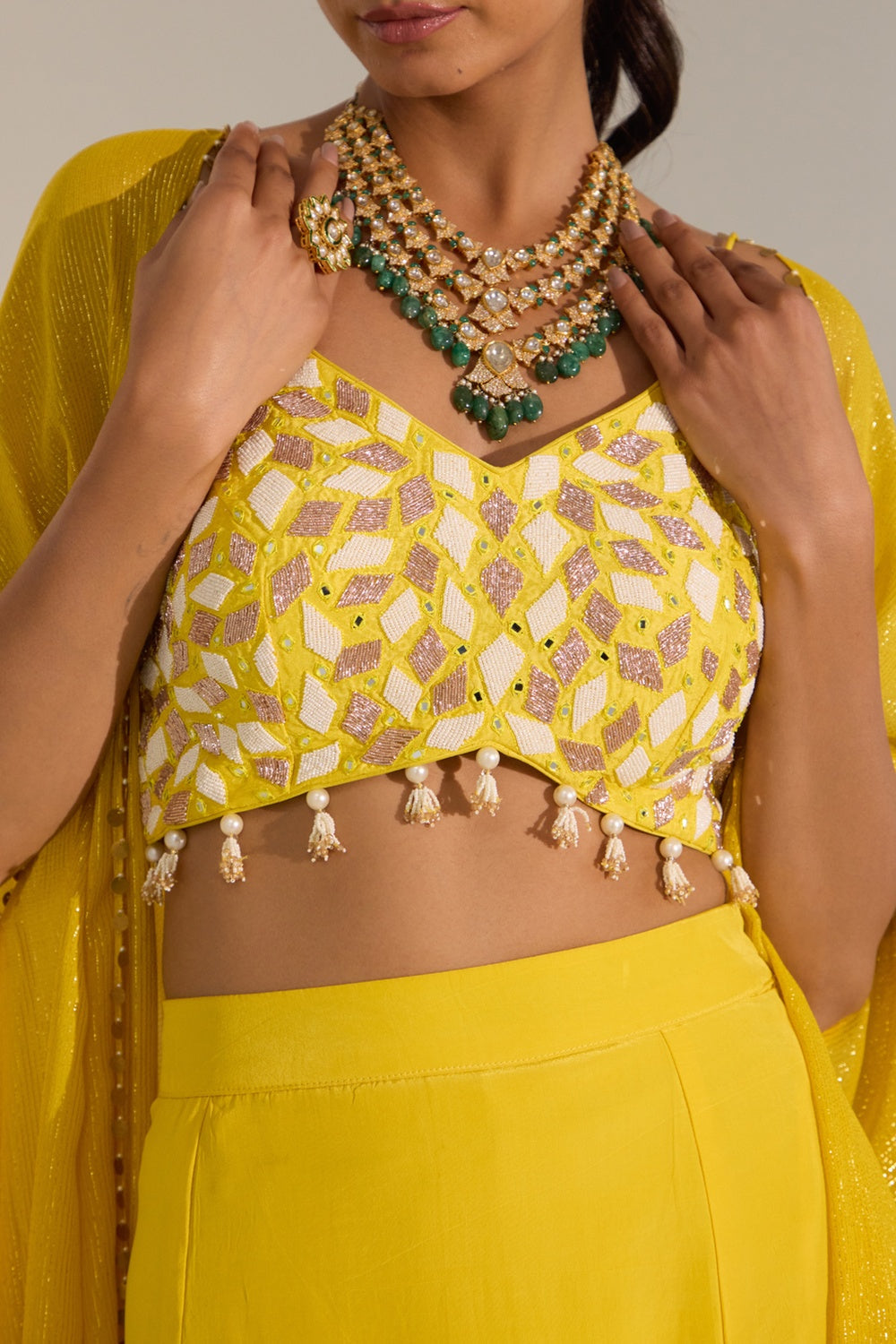 Yellow Bustier With Side Slit Skirt & Cape Set.