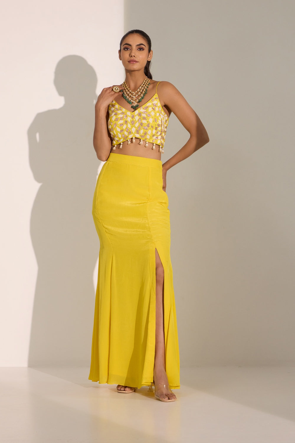 Yellow Bustier With Side Slit Skirt & Cape Set.