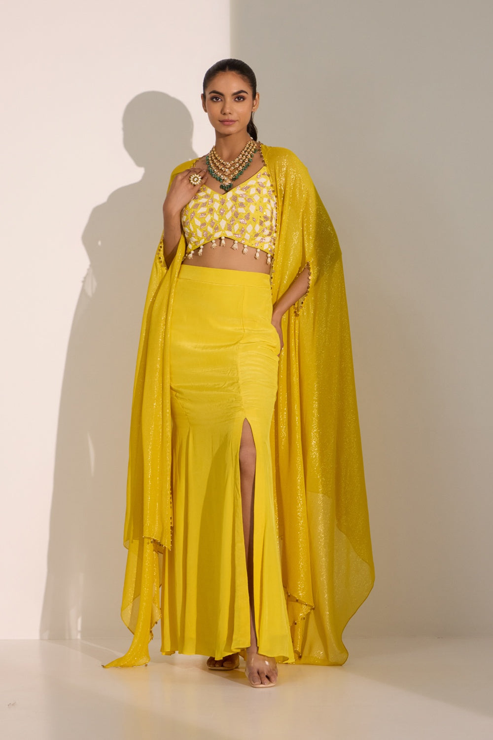 Yellow Bustier With Side Slit Skirt & Cape Set.