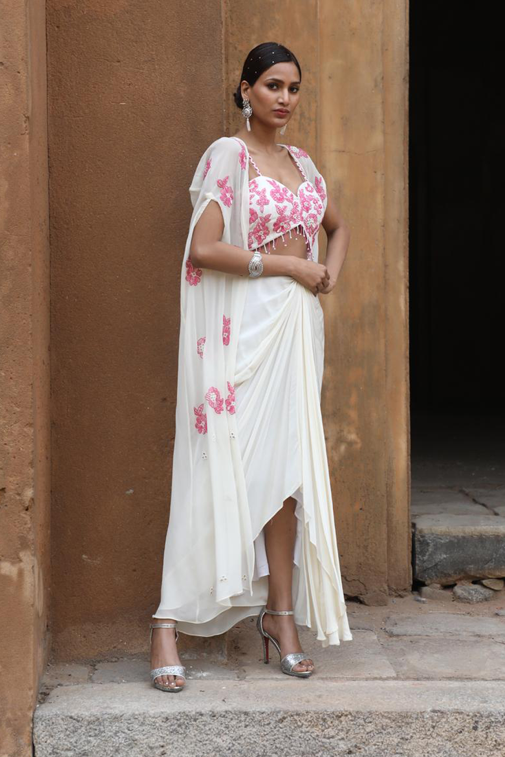 Ivory Drape Skirt With Bustier And Cape Set