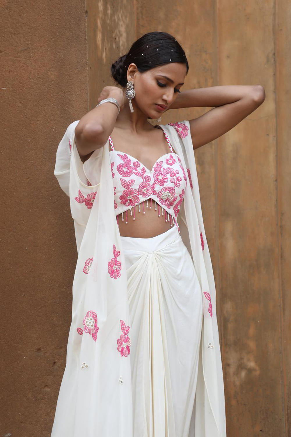Ivory Drape Skirt With Bustier And Cape Set