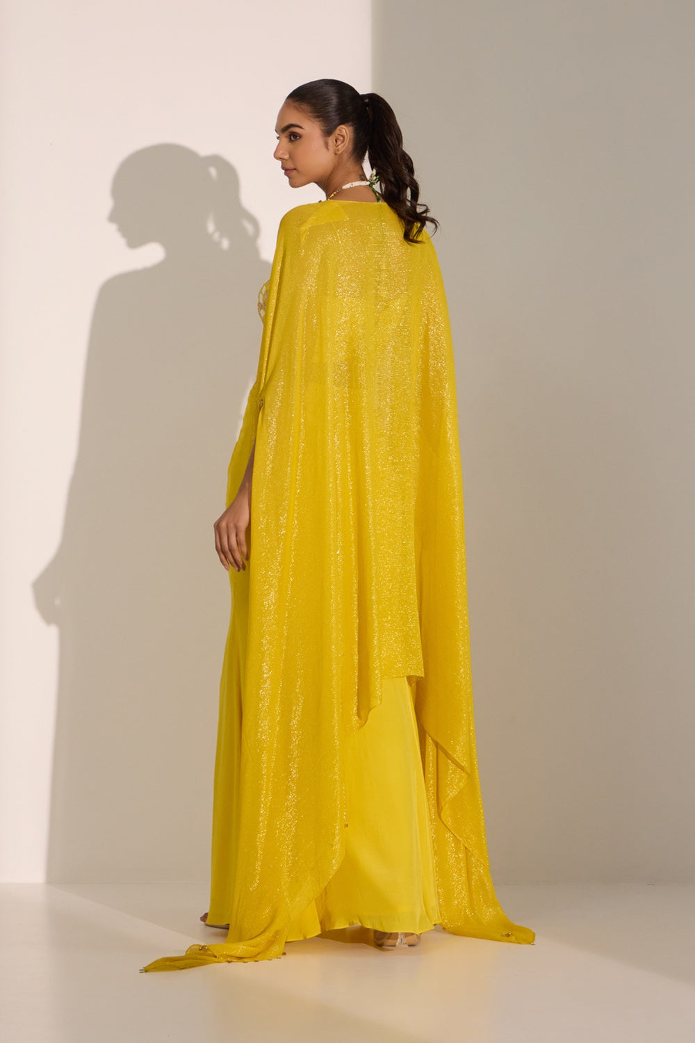 Yellow Bustier With Side Slit Skirt & Cape Set.