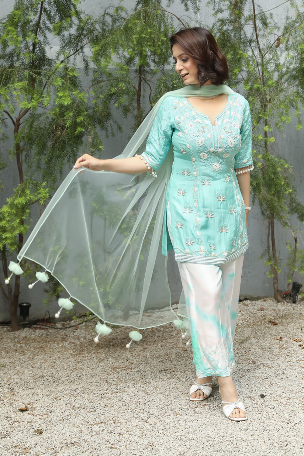 Aqua Blue Silk Floral Embroidered Straight Suit With White, Blue Tie Dye Pant And Blue Net Dupatta Set.